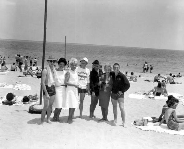 Women from a world wide tour pose for pictures at the beach during Easter vacation - Fort Lauderdale, Florida.