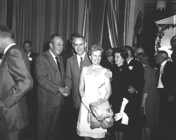 Walt Disney with unidentified couple during press conference - Orlando, Florida