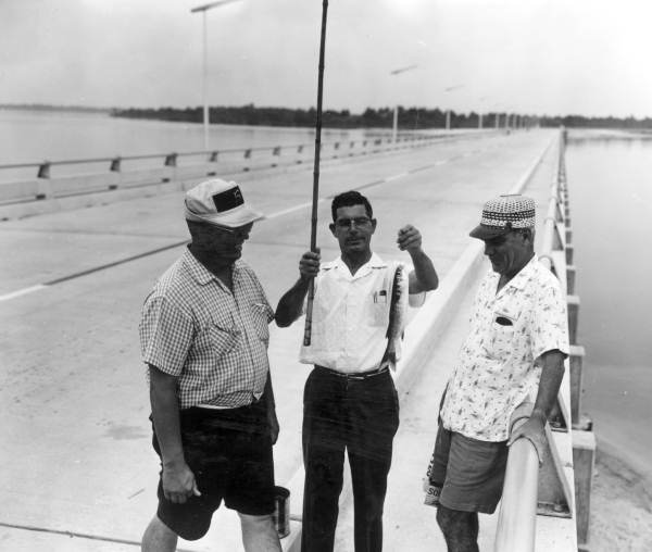 A man showing off his catch of fish at Deer Point Lake - Panama City, Florida.