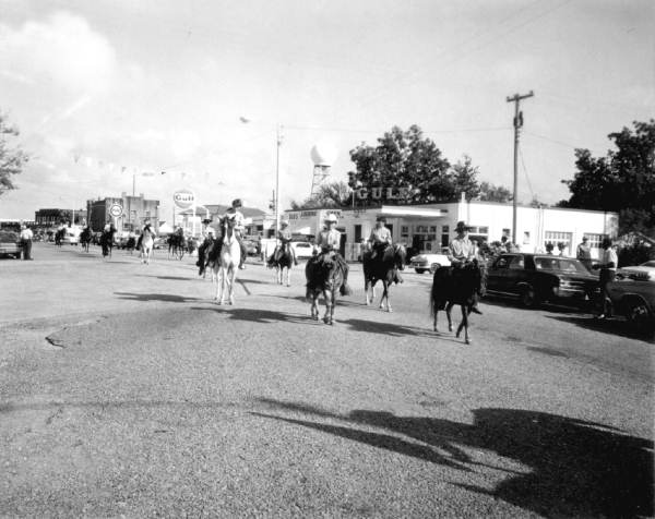 Men on horses during the Florida Seafood Festival - Apalachicola, Florida