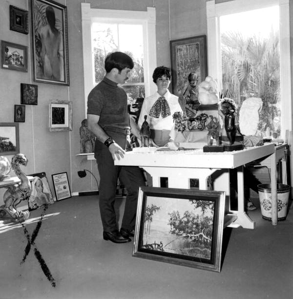 Couple in Artists' Unlimited Art Gallery - Key West, Florida.