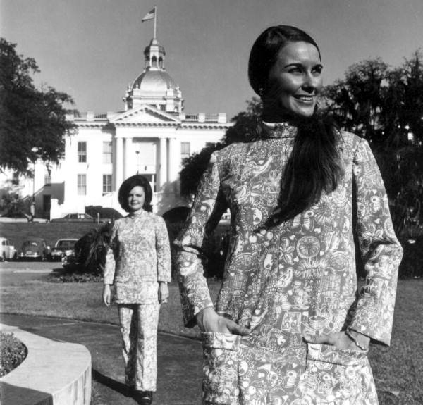 Young women model the new uniforms