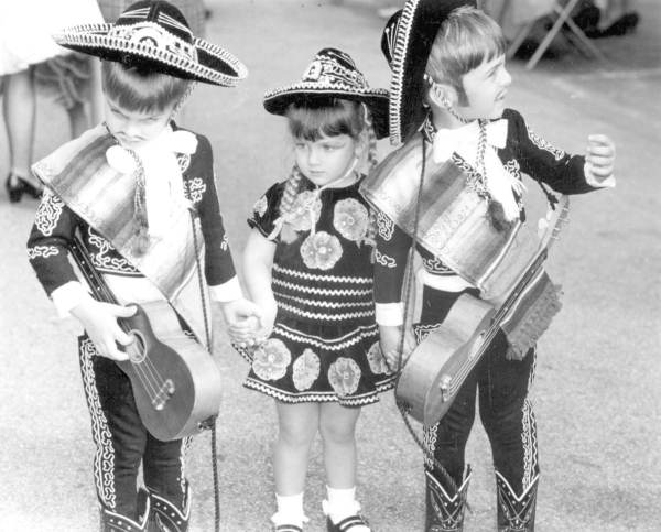 Three children dressed in Spanish costume at Ybor City - Tampa, Florida.