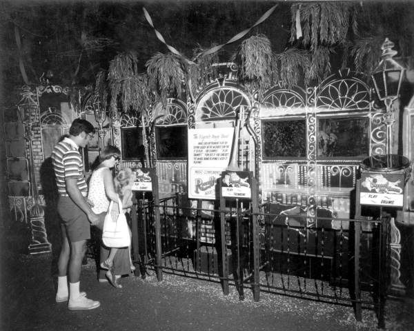 Family enjoying the Mystery Fun House - Orlando, Florida.