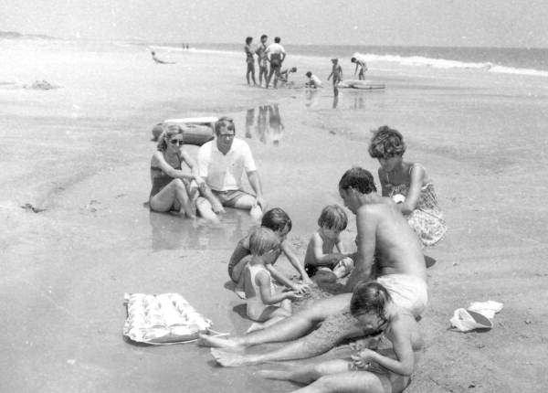 Families enjoy playing at the beach of a resort - Amelia Island, Florida