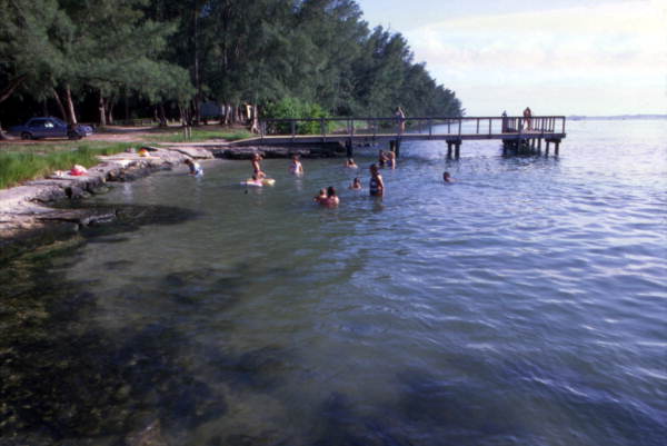 View showing people at the Sebastian Inlet State Park beach - Melbourne Beach, Florida.