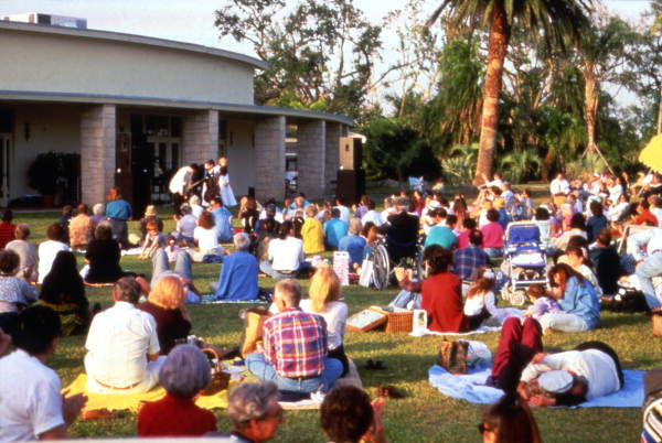 Visitors listening to a concert at the Fairchild Tropical Garden in Miami, Florida.