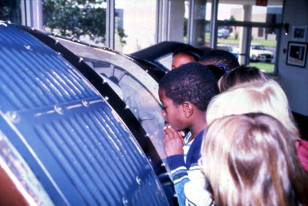 Students viewing exhibit at the Brevard Community College Astronaut Memorial Hall in Cocoa, Florida.