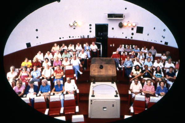 View showing audience in movie theater at the Brevard Community College Astronaut Memorial Hall in Cocoa, Florida.