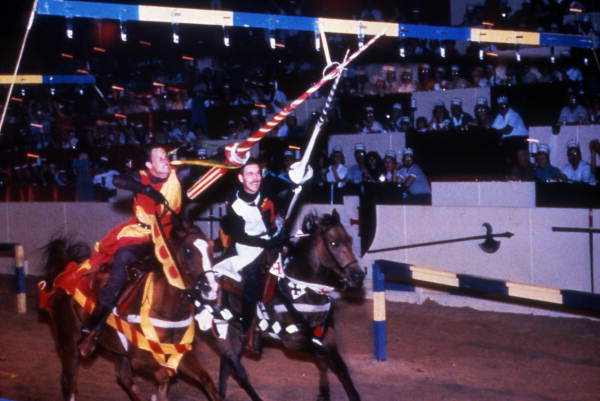 Men "ring jousting" at the Medieval Times Dinner and Tournament attraction in Kissimmee, Florida.