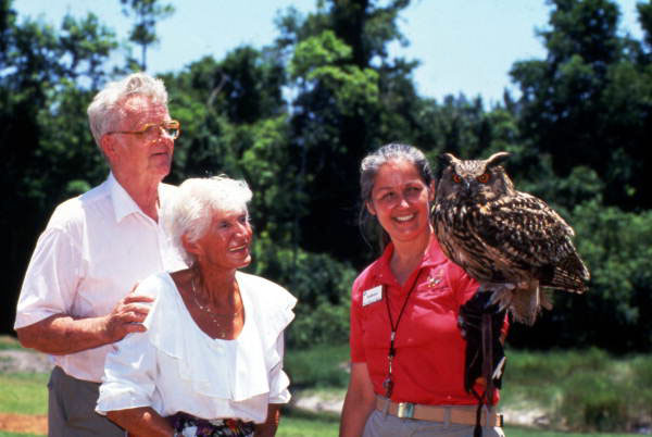 Handler with an Eagle Owl at the Weeki Wachee Springs amusement park - Weeki Wachee, Florida.