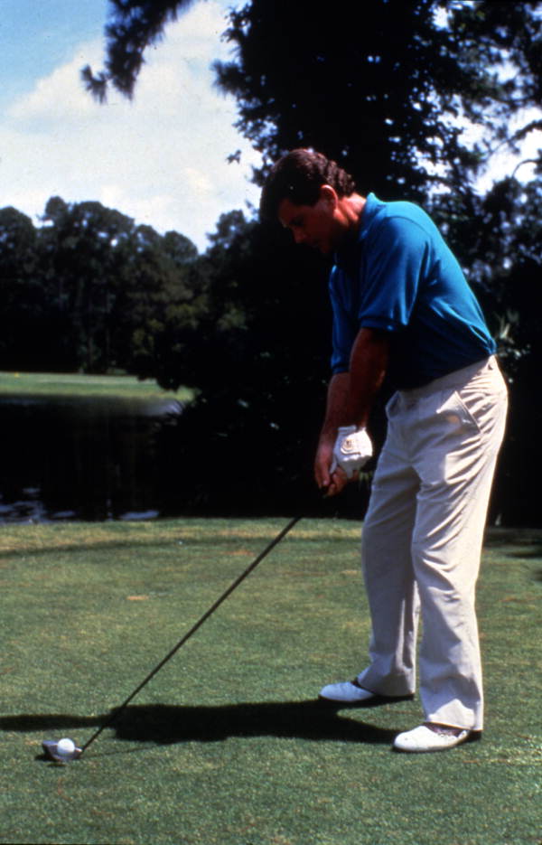 Golfer preparing to tee off at Daytona Beach, Florida.