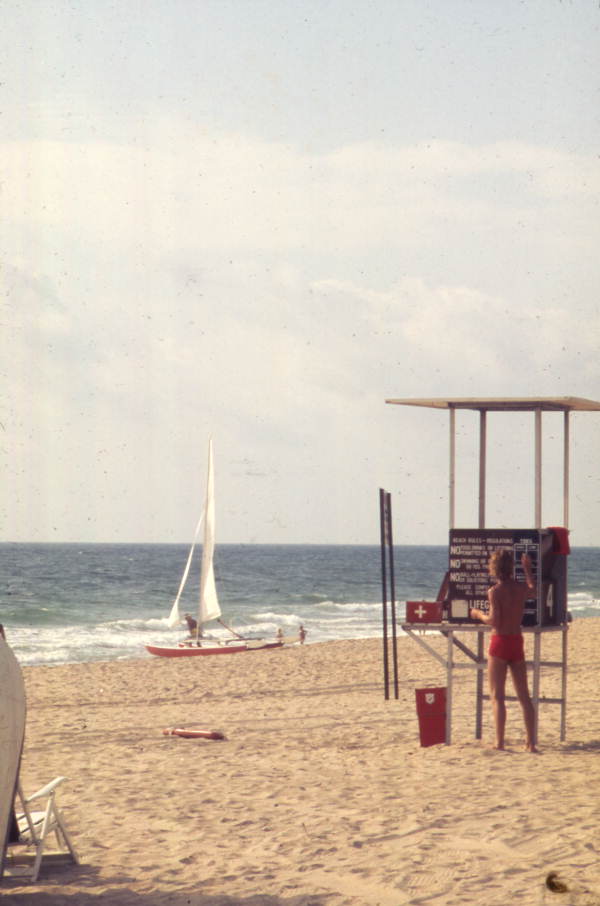 Lifeguard next to his stand at Ft. Lauderdale Beach, Florida.