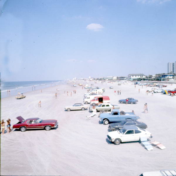 Bird's eye view of people and cars at the beach - Jacksonville, Florida