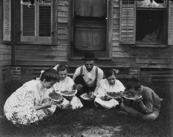 Egford Bly eating watermelon with his children and nieces - DeLand, Florida