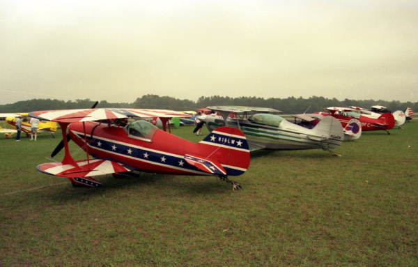 Aerobatic bi-planes parked at the Lakeland airport during the EAA Fly-In.