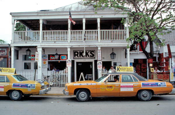 Taxicabs in front of Rick's Bar at 202 Duval Street - Key West, Florida.