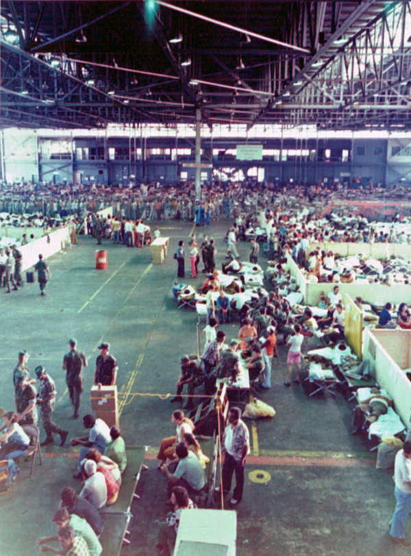 Cuban refugees from the Mariel Boatlift being temporarily housed in seaplane hangar at Trumbo Point - Key West, Florida.