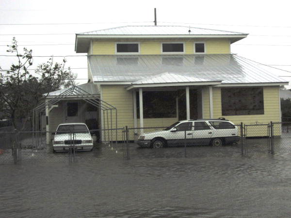 Yard at house on Flagler Avenue flooded by hurricane Dennis - Key West, Florida.