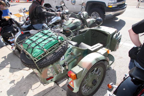 Old military motorcycle with sidecar on Main Street during Bike Week 2006 - Daytona Beach, Florida.
