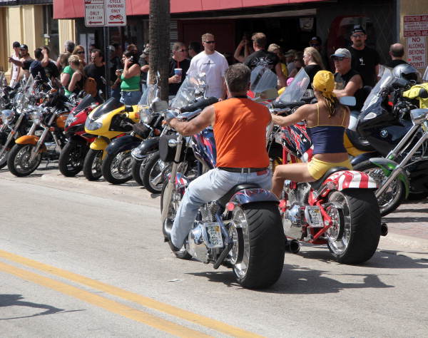 Motorcyclists riding down Main Street during Bike Week 2006 - Daytona Beach, Florida.
