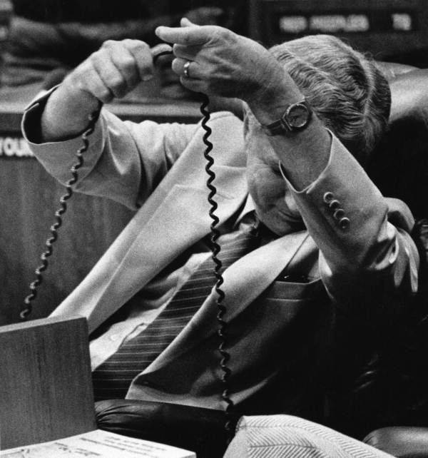 Rep. Bud Gardner untangles his phone cord - Tallahassee, Florida.