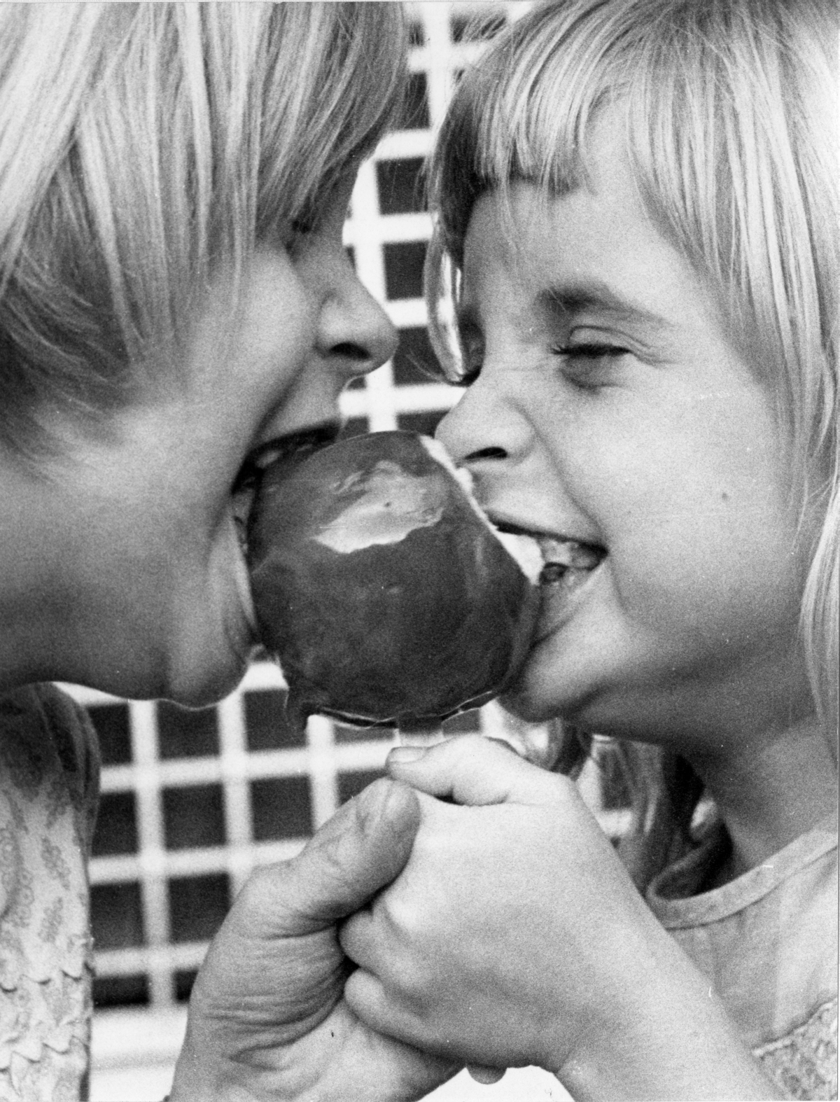 Leslie Dughi and Laurie Dughi shared an apple - Tallahassee, Florida.