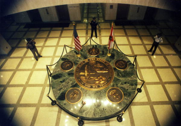 Security guards around the Great Seal of Florida - Tallahassee, Florida.