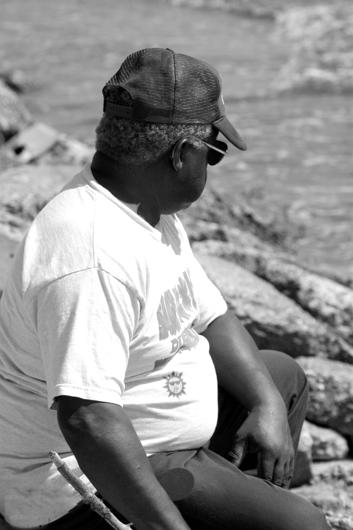 Unidentified man surveying aftermath of Hurricane Ivan - Navarre.