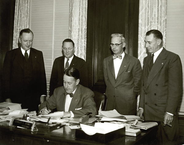 Governor Charley E. Johns signing an Elks proclamation in Tallahassee, Florida.
