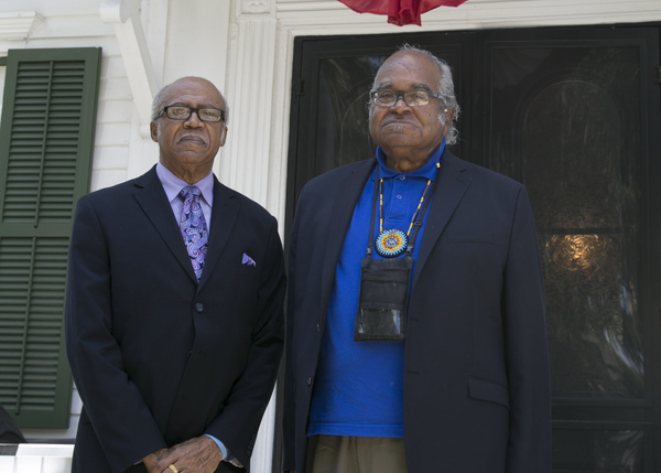 Reverend Henry Steele and John Due on the steps of the Knott House Museum during the Emancipation Day Celebration.