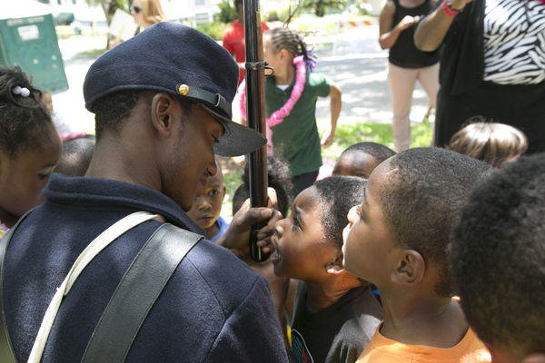 Union soldier reenactor with children during the Emancipation Day Celebration at the Knott House Museum in Tallahassee.