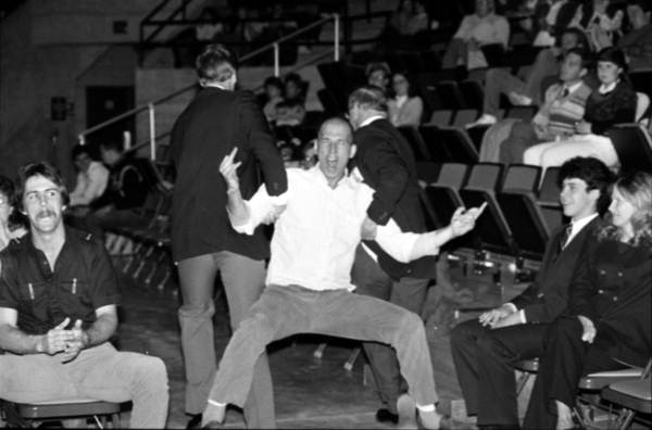 Jerry Falwell protestor is removed from the civic center - Tallahassee, Florida.