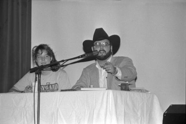 Auctioneer and young woman at the Bay Aid auctions - Tallahassee, Florida.
