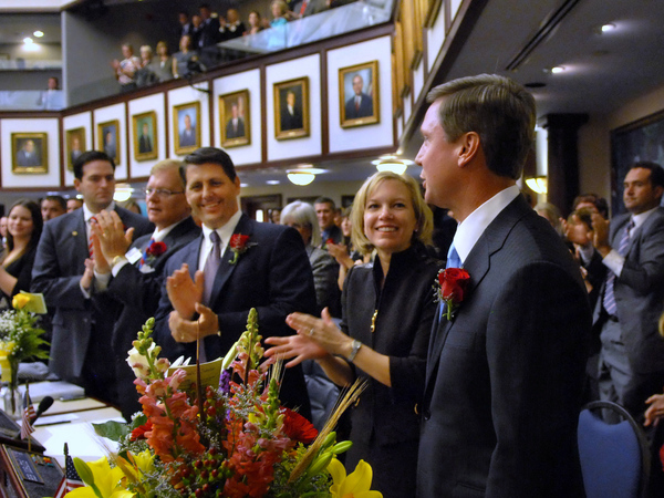 Ellen Cannon, center, joining the standing ovation for her husband Representative Dean Cannon, R-Winter Park, as he was confirmed as Speaker during an Organization session of the Legislature.