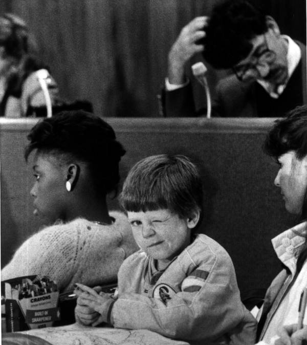 Brian Corning winks at the camera during legislative hearings - Tallahassee, Florida