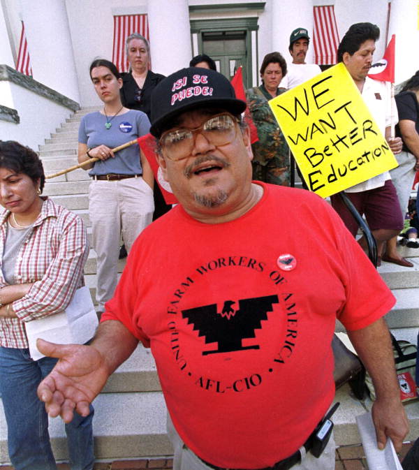 Frank Curiel, Florida director of the United Farm Workers of America, leading a protest to demand better pay - Tallahassee, Florida.