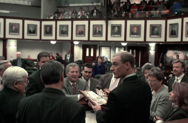 Heisman Trophy winning quarterback and NCAA national football championship winner Chris Weinke signing autographs in the capitol - Tallahassee, Florida