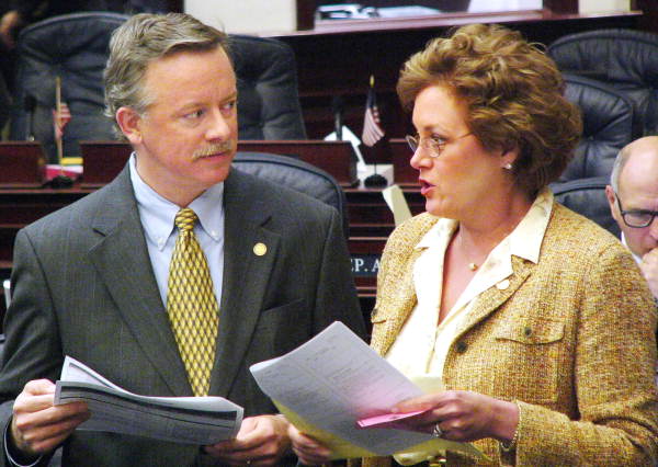 Florida State Representative Jeffrey Kottkamp, R-Cape Coral, conferring with Representative Trudi Williams, R-Fort Myers, on the House floor during the 2005 Legislature.