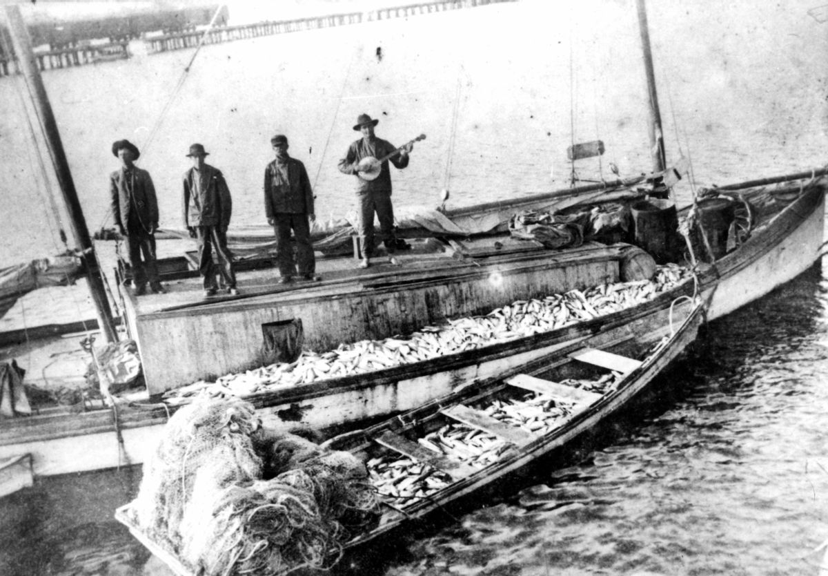 View showing a St. Andrews Bay fishing boat and crew.