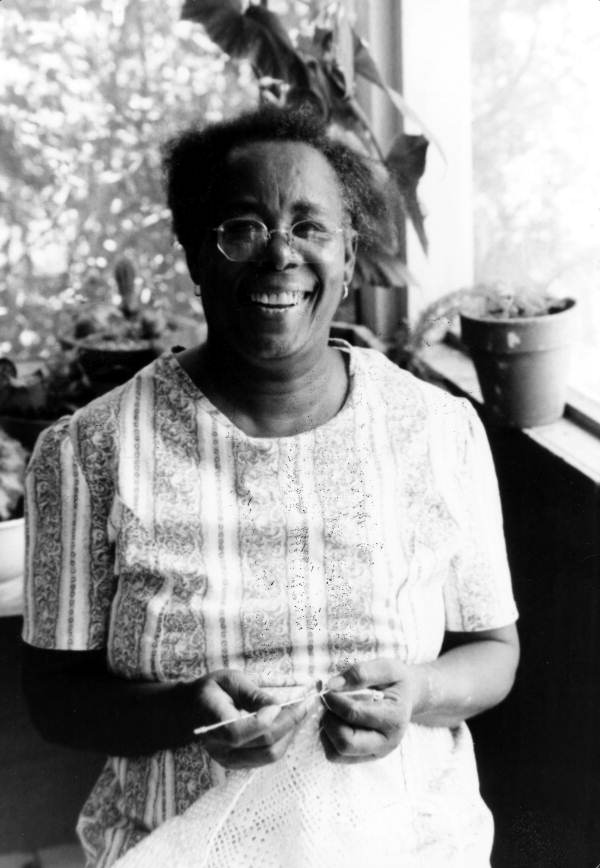 Portrait of Claudie Mae Hamilton knitting in Gainesville, Florida.