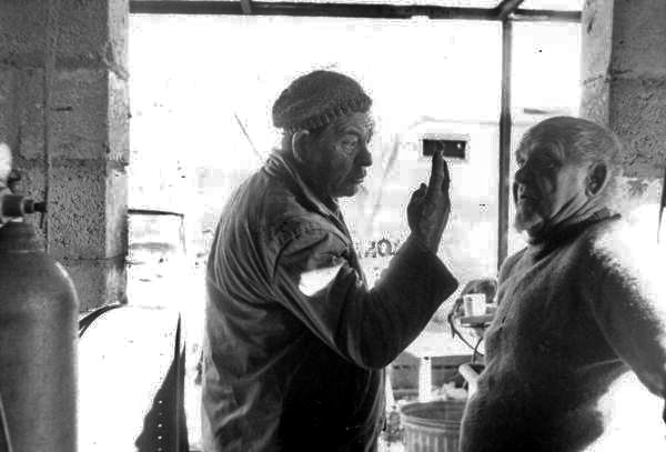 Unidentified man, left, with sculptor Stanley Papio in Key Largo, Florida.
