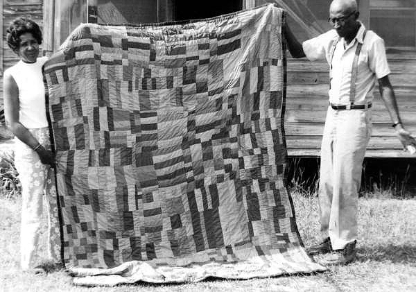 Queenie Udell with one of her quilts in White Springs, Florida.