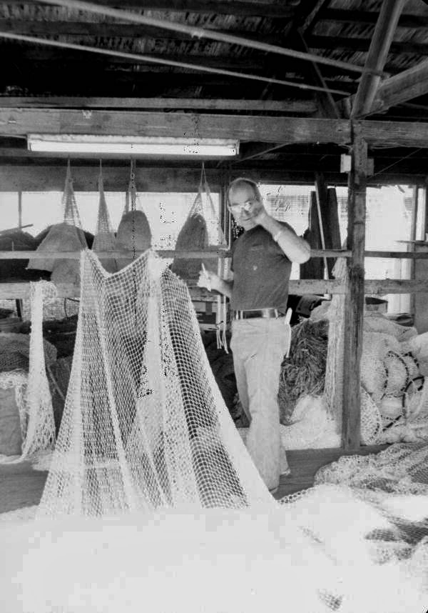 Net maker working on a fishing net in Key West, Florida.