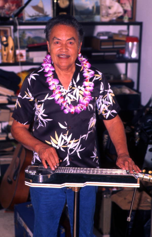 Richard "Dick" Sanft playing the Hawaiian steel guitar at his house in Kissimmee, Florida.
