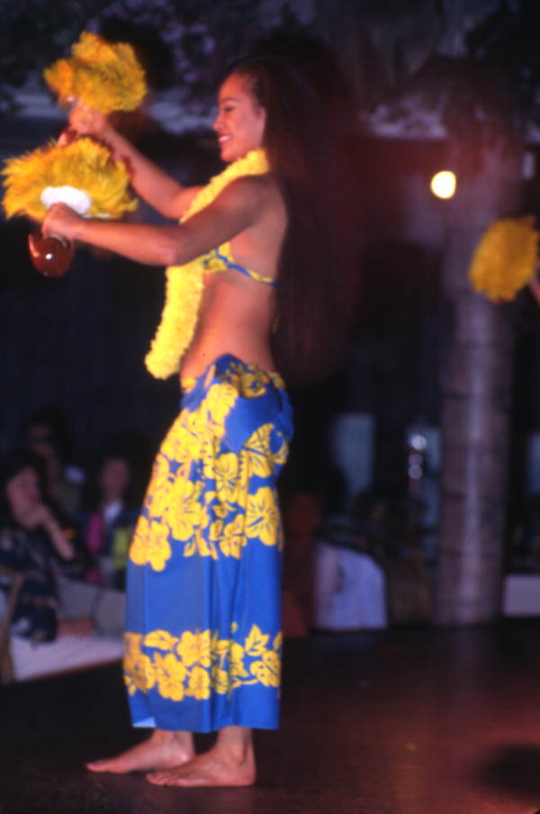 View showing a Polynesian dancer during a performance at Sea World in Orlando, Florida.