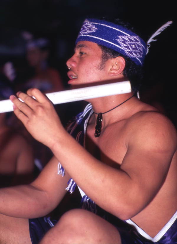 Close-up view of a Polynesian dancer shown during a performance at Sea World in Orlando, Florida.