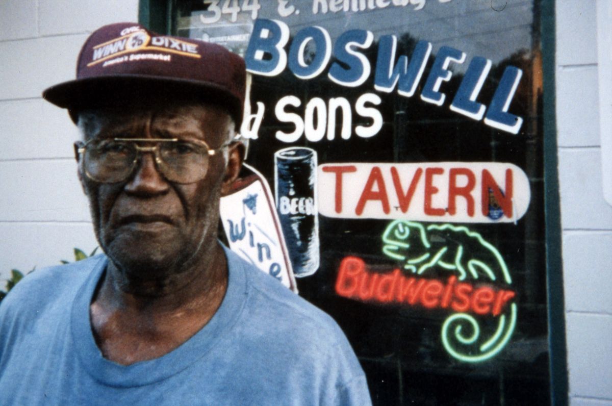 Mr. Boswell standing in front of his tavern at 344 E. Kennedy Blvd. in Eatonville, Florida.