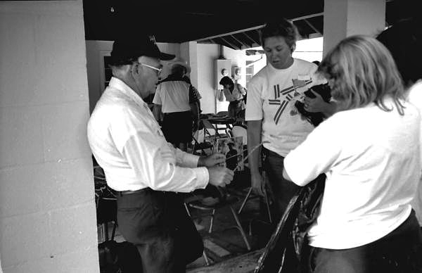 Dowlin Morgan showing Folk Festival attendees the art of water witching- White Springs, Florida