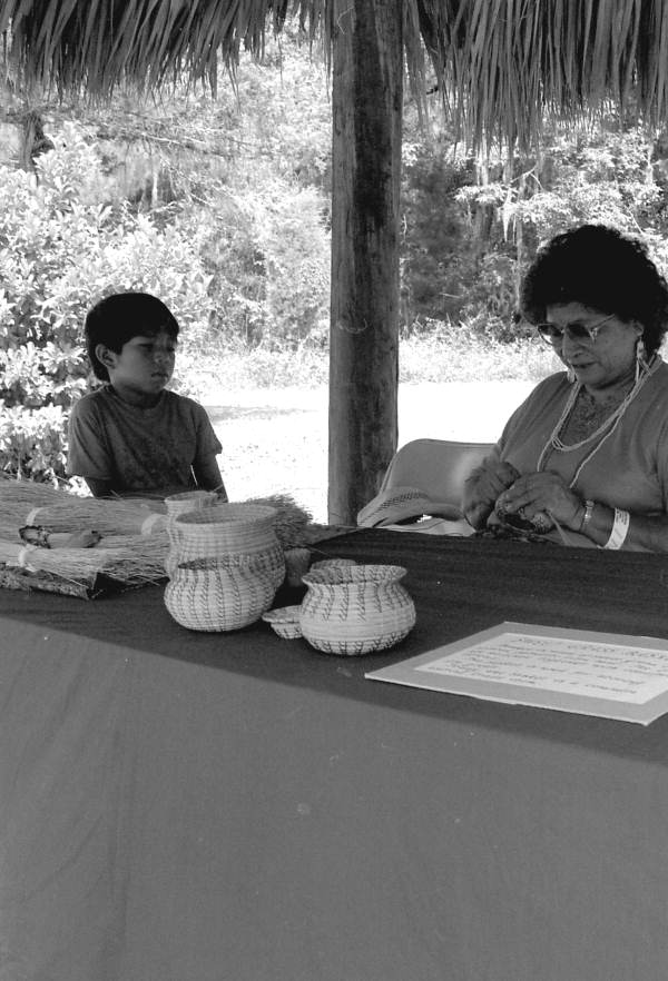 Seminole Indian Agnes Cypress making Seminole dolls- White Springs, Florida
